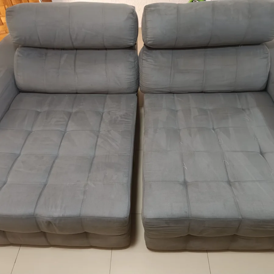 Sofá retrátil cinza depois da higienização, limpo e renovado